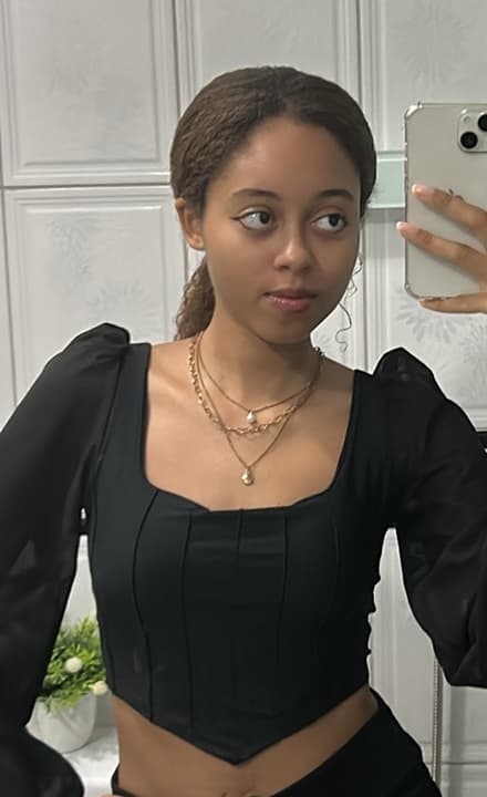 vintage couple photoshoot: front-facing selfie of woman