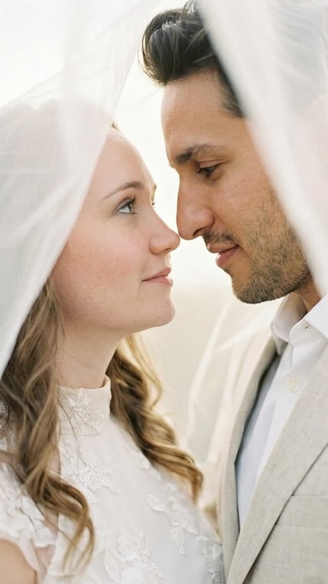 convert two photos into one: couple under sheer veil, soft focus, unity